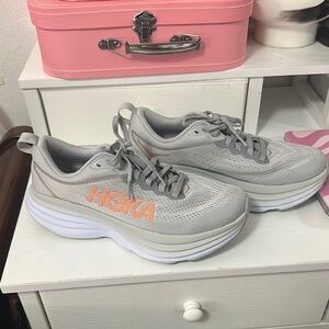 Hoka Gray and Orange Athletic Shoes with Chunky Sole